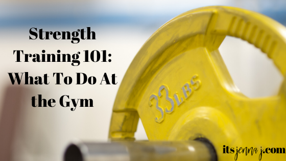 A bright yellow barbell plate with the words "Strength Training 101: What To Do At the Gym" in black. 