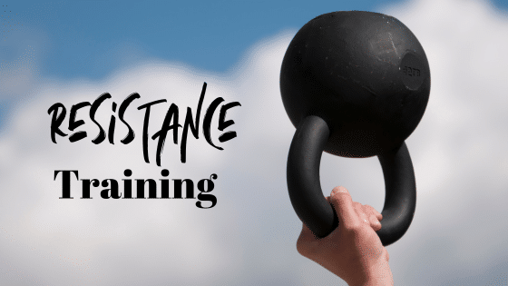 A blue sky with white clouds are in the background. A hand holds a kettlebell upside down. The words "Resistance Training" are to the left in black text.